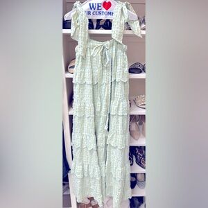 Buddy Love maxi dress size XS. The color is a light blue/green and yellow.